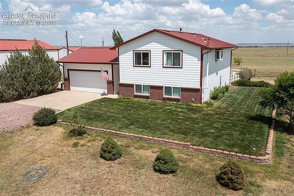 5 Acres of Land with Home for Sale in Peyton, Colorado