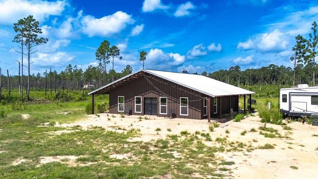 11.3 Acres of Land with Home for Sale in Kountze, Texas