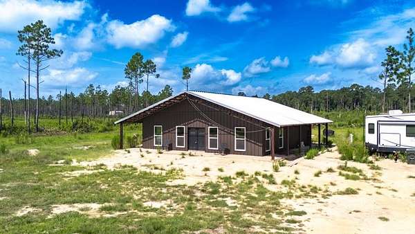 11.3 Acres of Land with Home for Sale in Kountze, Texas