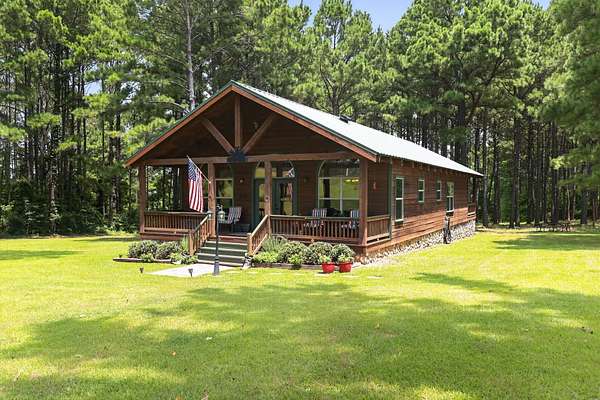 20.8 Acres of Land with Home for Sale in Jefferson, Texas