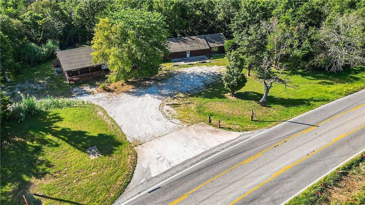 5.38 Acres of Land with Home for Sale in Garfield, Arkansas