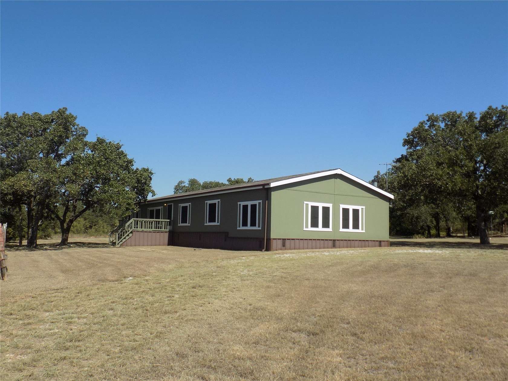 13.2 Acres of Land with Home for Sale in Poolville, Texas