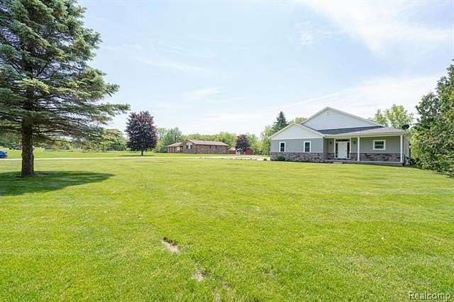 1.8 Acres of Land with Home for Sale in Oceola Township, Michigan