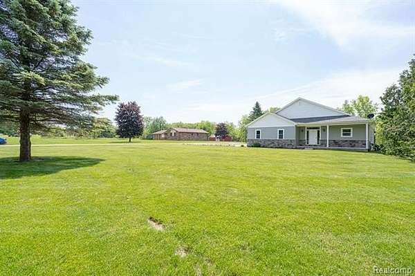 1.8 Acres of Land with Home for Sale in Oceola Township, Michigan