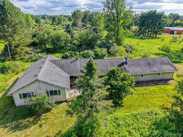 10 Acres of Land with Home for Sale in Iosco Township, Michigan