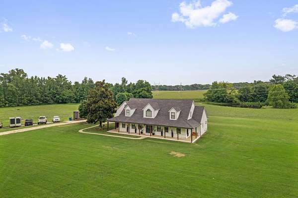 10.6 Acres of Recreational Land with Home for Sale in Brighton, Tennessee