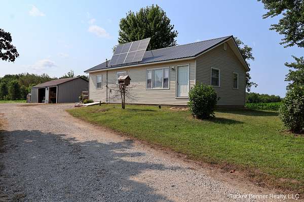 4 Acres of Land with Home for Sale in Holton, Michigan