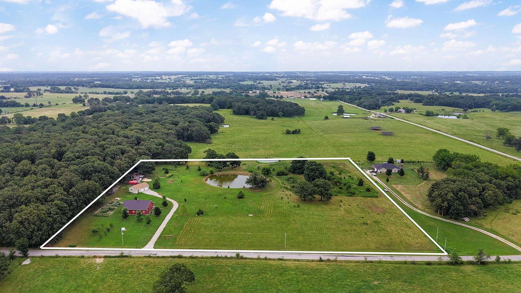 10 Acres of Land with Home for Sale in Aurora, Missouri