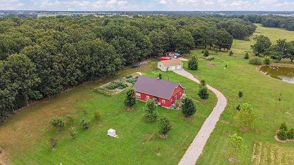 10 Acres of Land with Home for Sale in Aurora, Missouri
