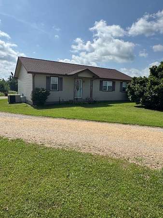 12.4 Acres of Land with Home for Auction in Lafayette, Tennessee