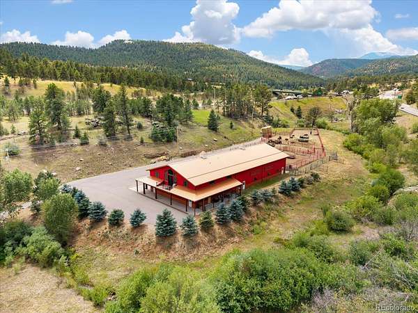 10.9 Acres of Land with Home for Sale in Evergreen, Colorado