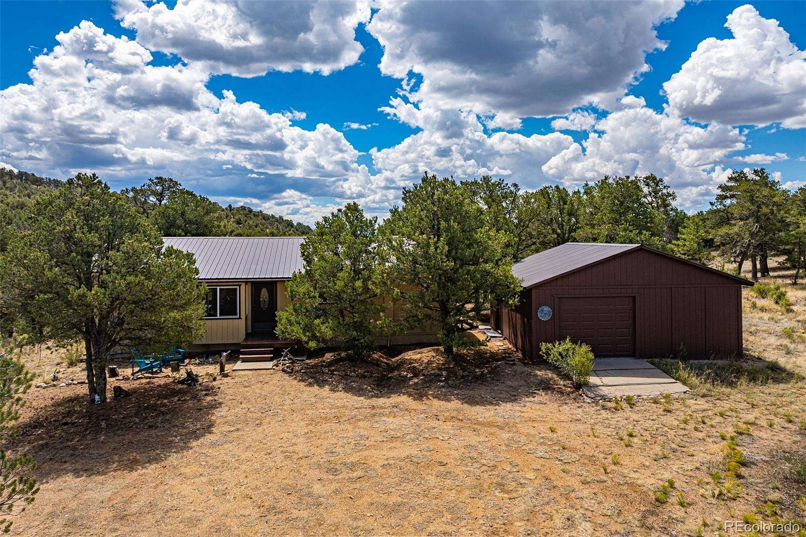 6.78 Acres of Land with Home for Sale in Cotopaxi, Colorado