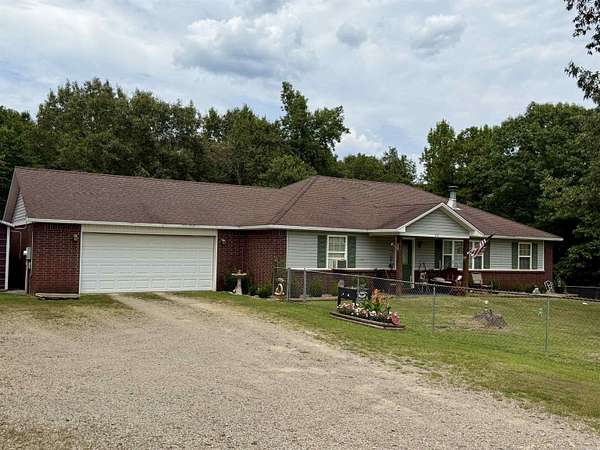 2.49 Acres of Land with Home for Sale in Clarksville, Arkansas