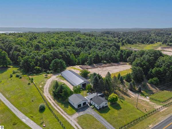 6 Acres of Land with Home for Sale in Williamsburg, Michigan