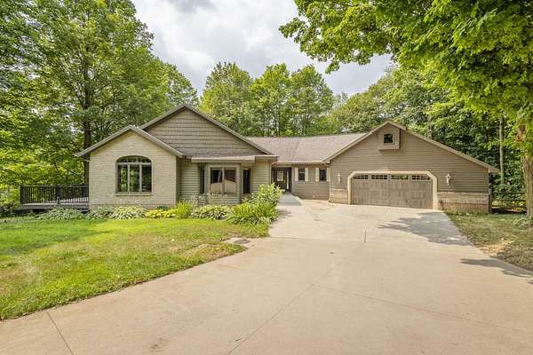 8 Acres of Land with Home for Sale in Caledonia, Michigan