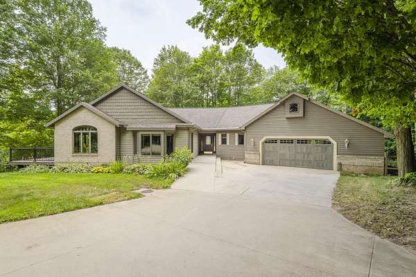 8 Acres of Land with Home for Sale in Caledonia, Michigan