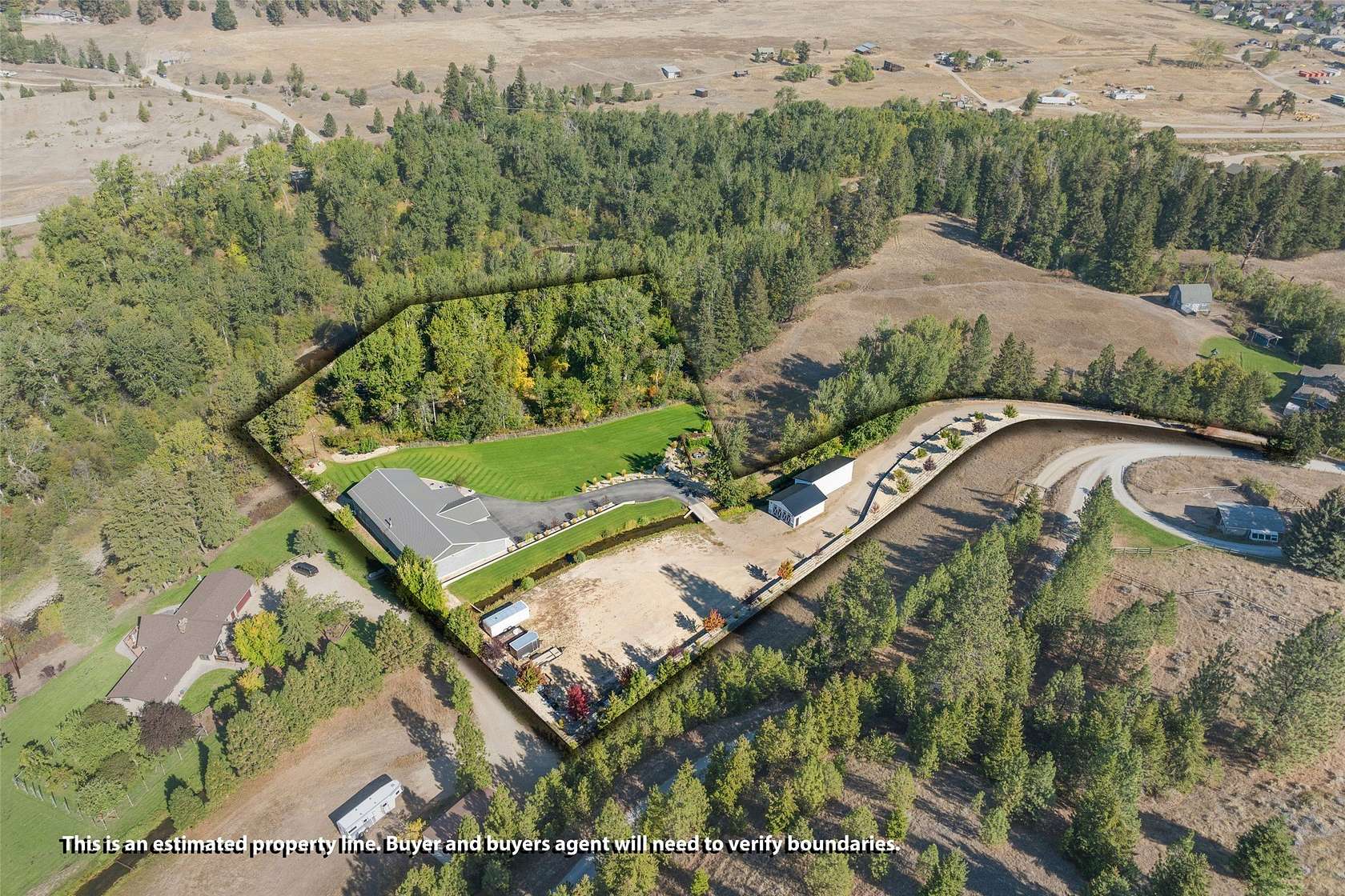 4.76 Acres of Land with Home for Sale in Lolo, Montana