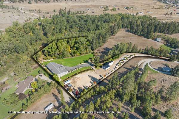 4.76 Acres of Land with Home for Sale in Lolo, Montana