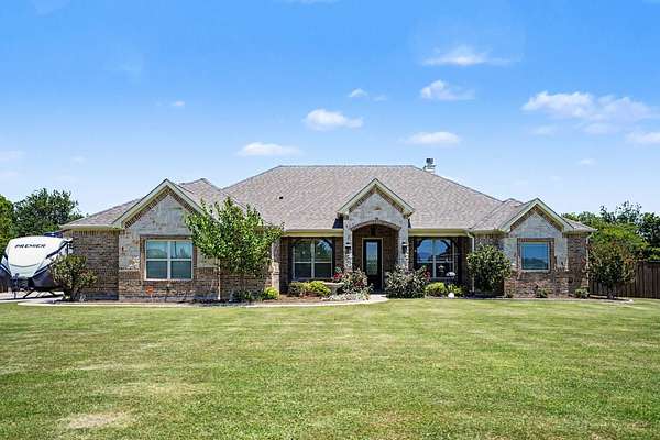 1.64 Acres of Land with Home for Sale in Royse City, Texas