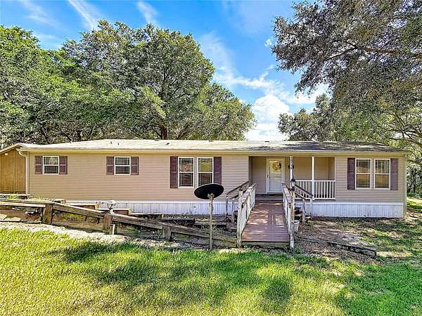 4.38 Acres of Land with Home for Sale in Umatilla, Florida