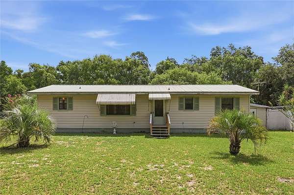 6.4 Acres of Land with Home for Sale in DeLand, Florida