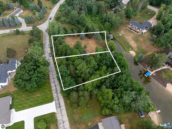 0.65 Acres of Residential Land for Sale in Weidman, Michigan