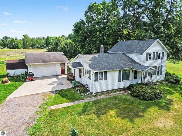 6.14 Acres of Land with Home for Sale in Elwell, Michigan
