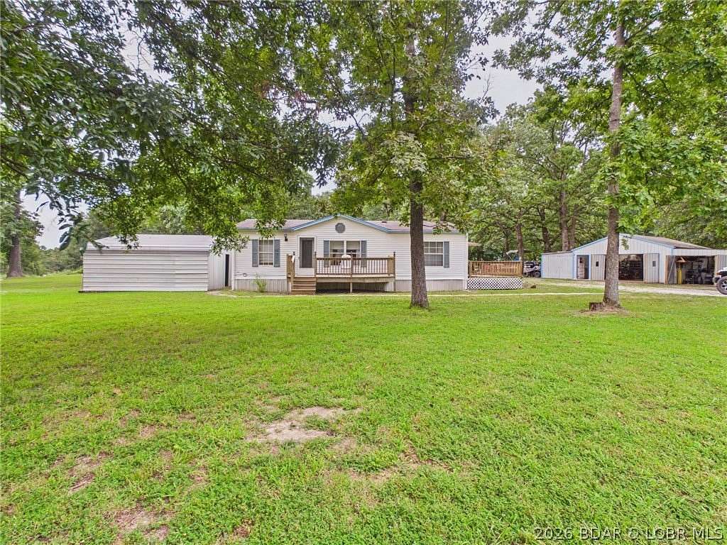 1.75 Acres of Land with Home for Sale in Gravois Mills, Missouri