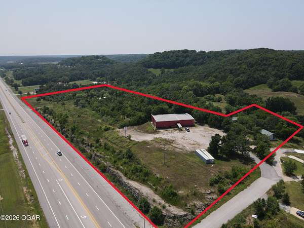 19.8 Acres of Improved Commercial Land for Sale in Jane, Missouri