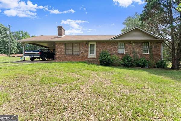 6 Acres of Land with Home for Sale in Cumming, Georgia
