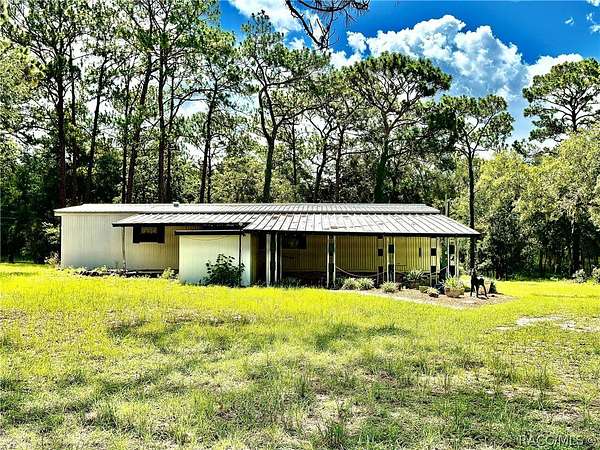 3 Acres of Land with Home for Sale in Inverness, Florida