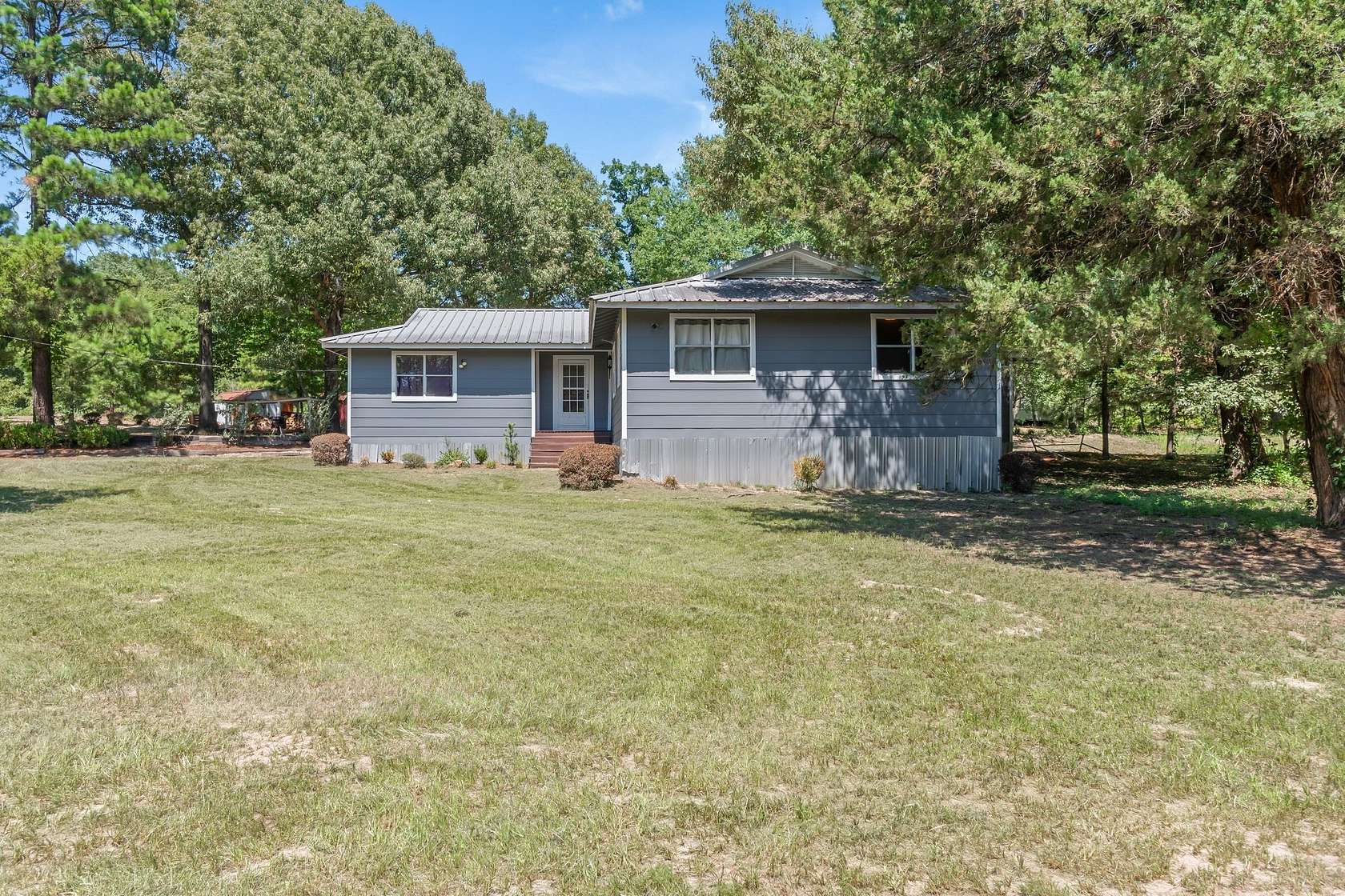 6.87 Acres of Land with Home for Sale in Ben Wheeler, Texas