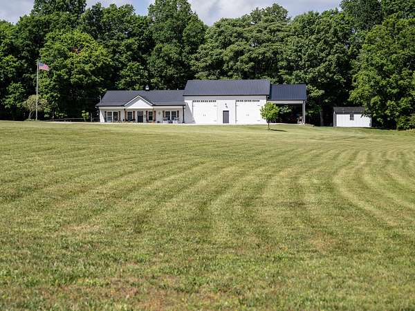 5.42 Acres of Land with Home for Sale in Charlotte, Tennessee