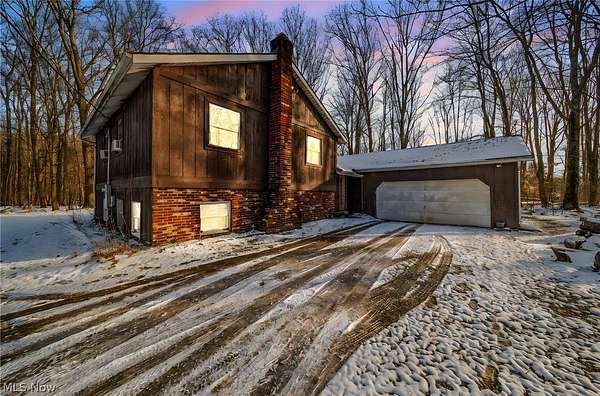 8.1 Acres of Land with Home for Sale in Thompson, Ohio