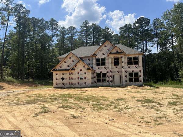 1.67 Acres of Land with Home for Sale in Stockbridge, Georgia