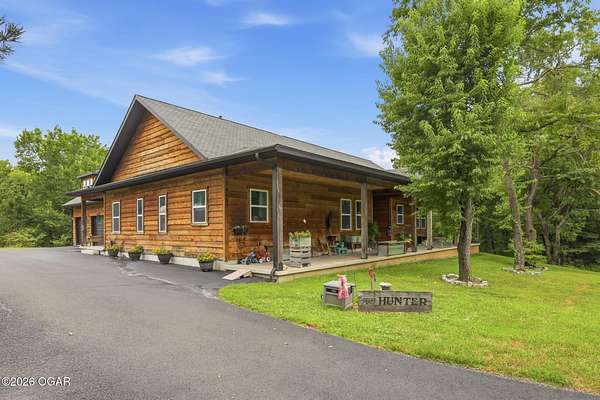 5.66 Acres of Land with Home for Sale in Carthage, Missouri