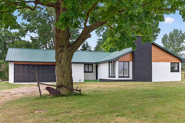 6.89 Acres of Land with Home for Sale in Gladwin, Michigan