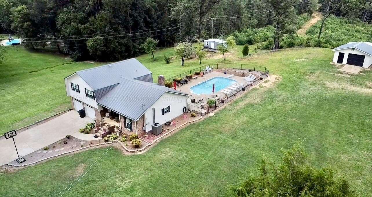 61 Acres of Land with Home for Sale in Fayette, Alabama