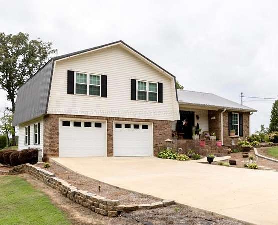 61 Acres of Land with Home for Sale in Fayette, Alabama