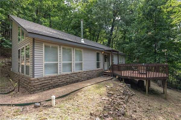 3.77 Acres of Land with Home for Sale in Mountainburg, Arkansas