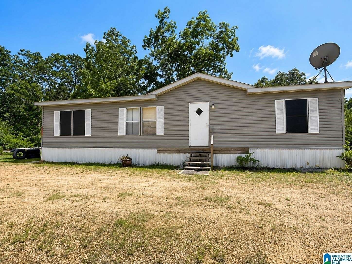 6.36 Acres of Land with Home for Sale in Anniston, Alabama