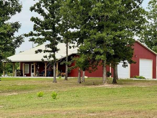 39.7 Acres of Recreational Land with Home for Sale in Hartshorn, Missouri