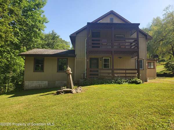 66.3 Acres of Land with Home for Sale in Kingsley, Pennsylvania