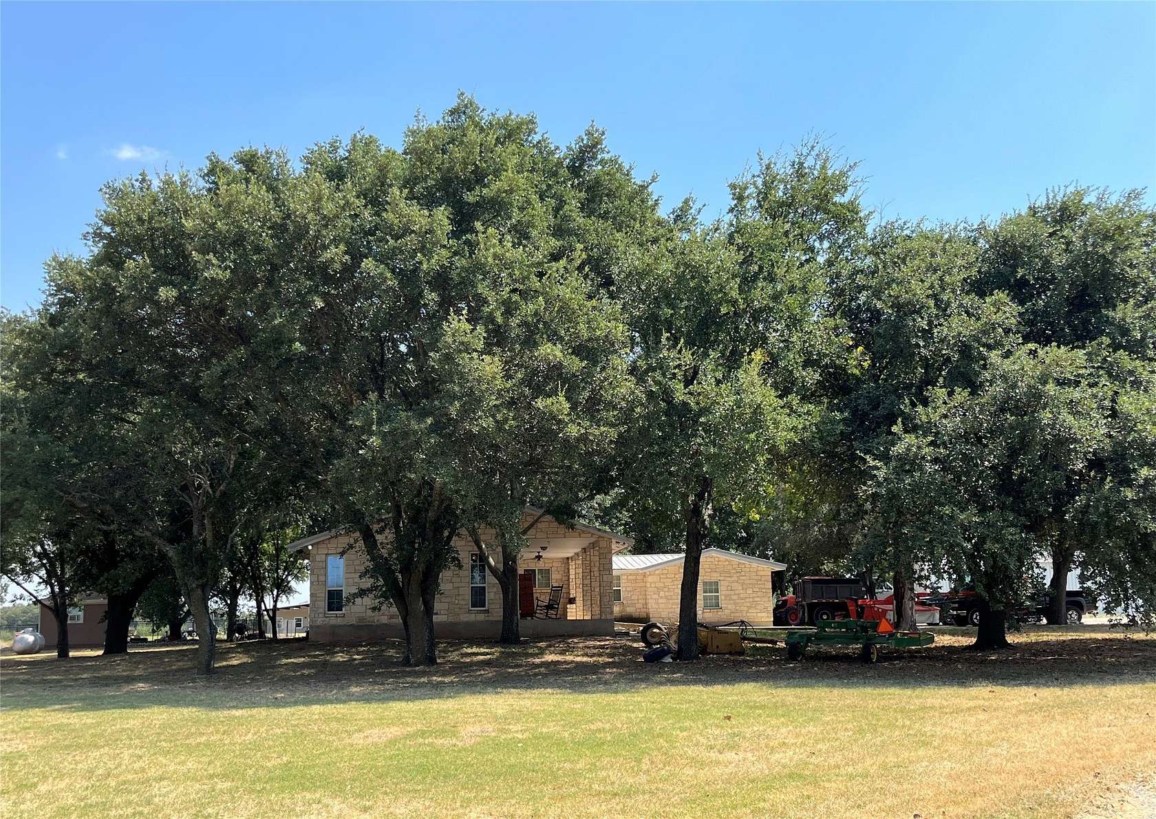 75.6 Acres of Agricultural Land with Home for Sale in Waco, Texas