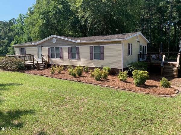 2.82 Acres of Land with Home for Auction in Angier, North Carolina