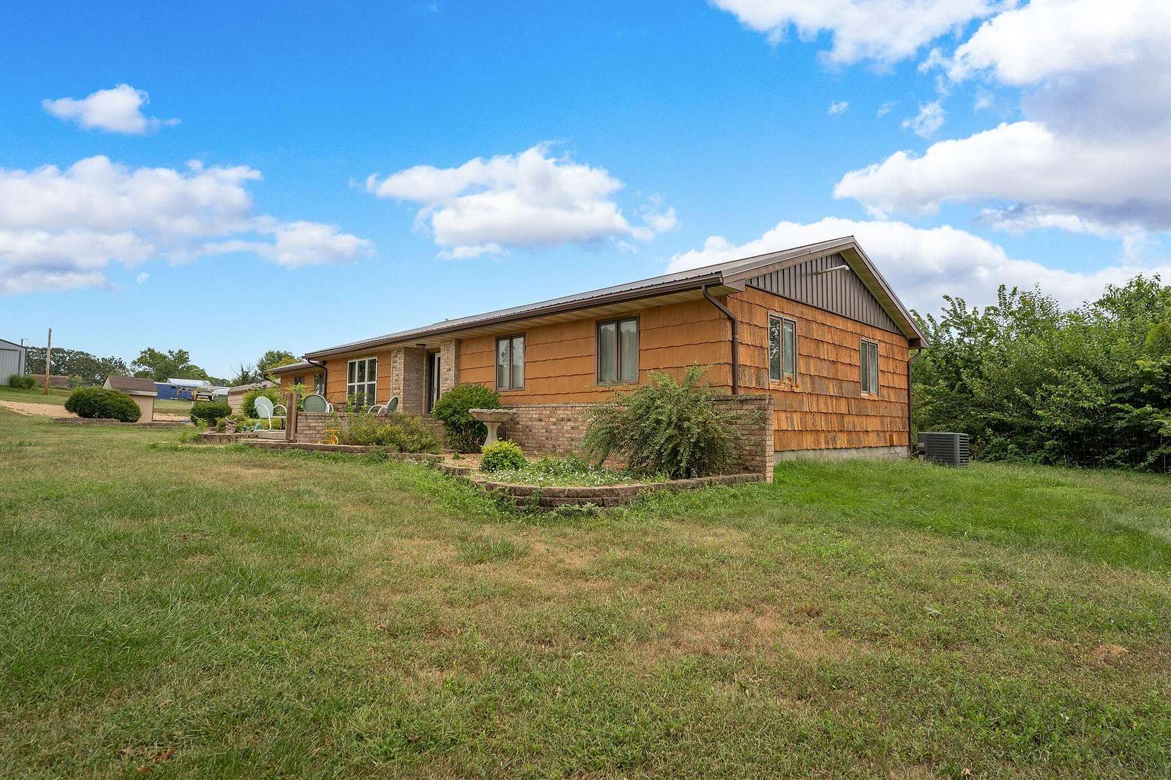 80 Acres of Agricultural Land with Home for Sale in Norwood, Missouri