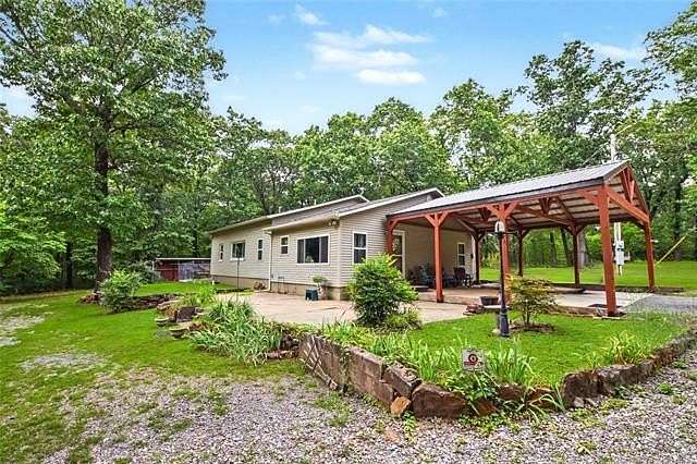 9.84 Acres of Land with Home for Sale in Cookson, Oklahoma