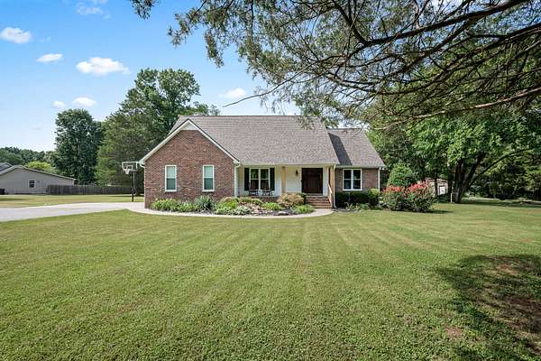 9.7 Acres of Land with Home for Sale in Rockvale, Tennessee