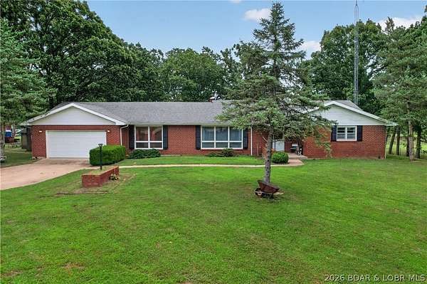 33.5 Acres of Land with Home for Sale in Waynesville, Missouri