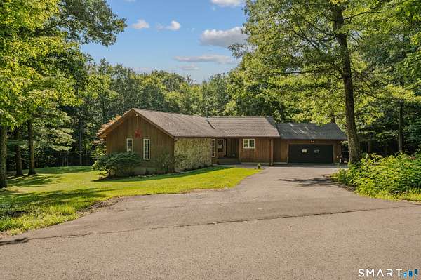 2.38 Acres of Land with Home for Sale in Stafford, Connecticut